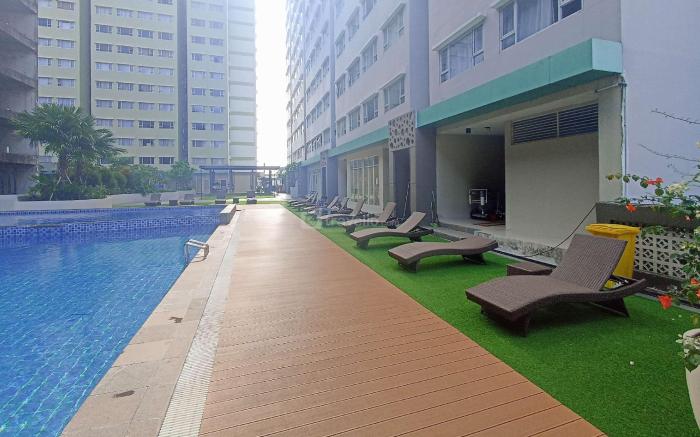 Cozy 2BR @ Royal Makassar Apartment By Travelio