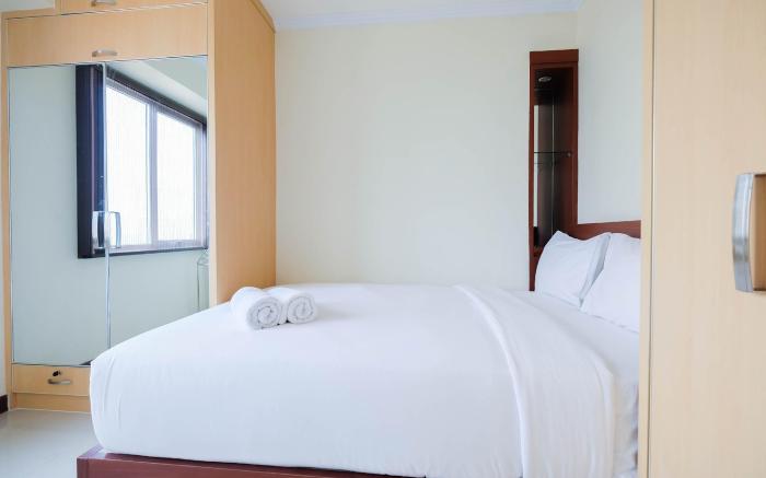 Cozy 2BR Bassura City Apartment By Travelio
