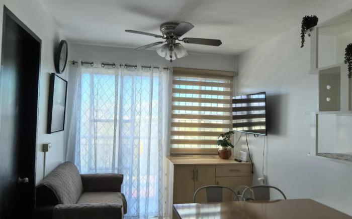 Two-bedroom Cityscape Bacolod 1001  w/ Pool Access