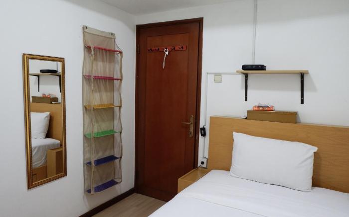 Apt 3BR  at Sudirman Tower Condominium By Travelio
