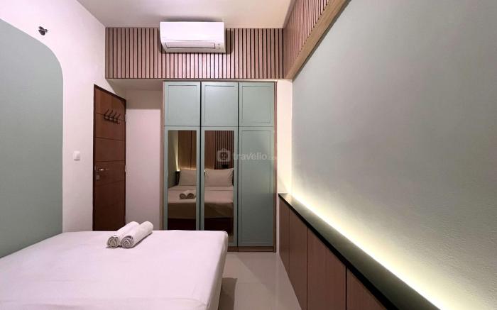 Warm Homey 2BR Vida View Makassar Apt By Travelio