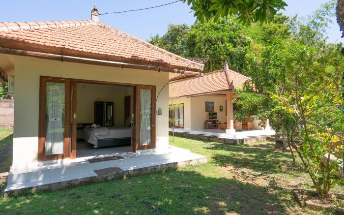 Calm Haven Villa with Amabela Garden Lovina Mitra RedDoorz