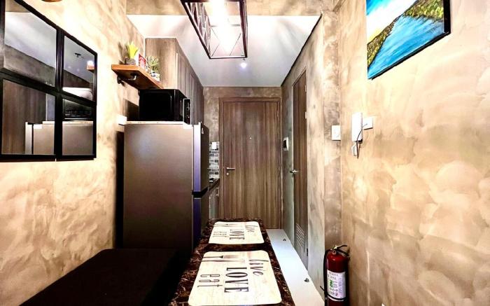 Luxury Industrial-themed Condo in Fame Residences
