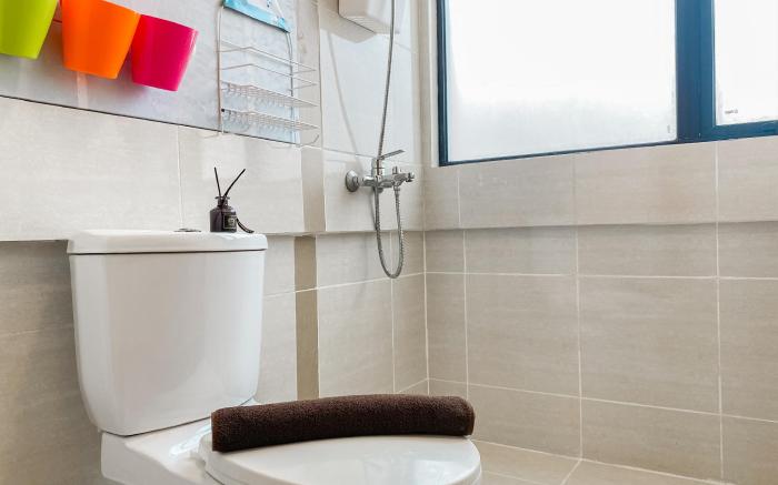 Warm & Homey 1BR at Meikarta Apartment By Travelio