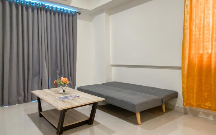 Warm & Homey 1BR at Meikarta Apartment By Travelio