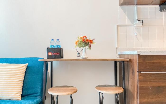 Comfort & Well 2BR at Tamansari Iswara By Travelio