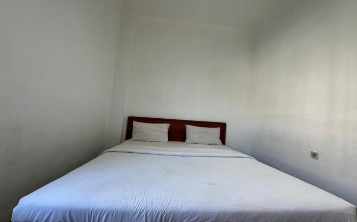 OYO 94244 Ezhar Boka Homestay Near GOR Sulis Bulutangkis