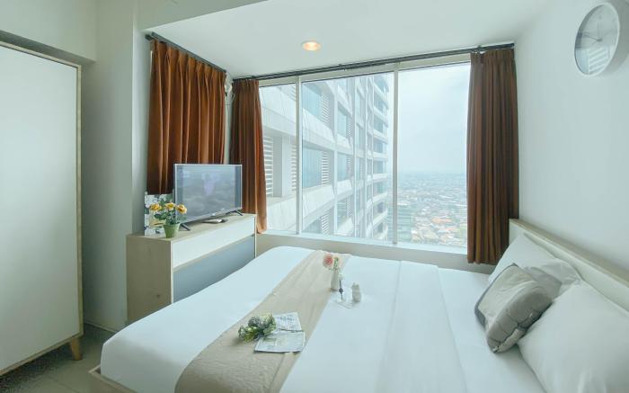 Cozy Studio at Apt Grand Kamala Lagoon By Travelio