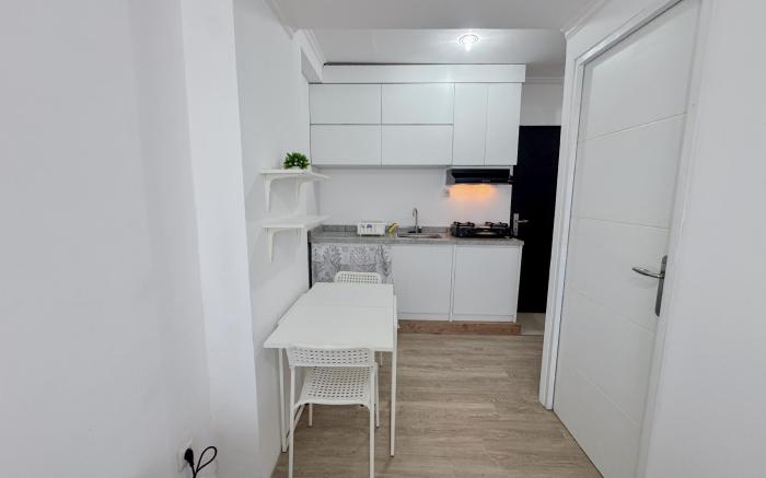 Compact Restful 2BR at Menara Rungkut By Travelio