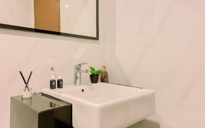 Homey Warm 1BR at Ciputra World 2 Apt By Travelio