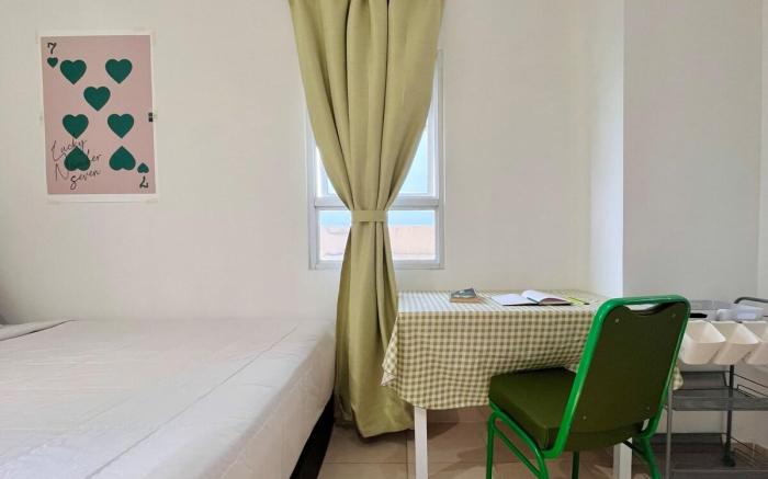 Sun-Kissed, Breezy Studio with a Green Glow