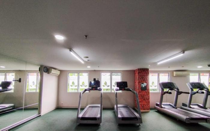 Tranquil 1BR at Parahyangan Residence By Travelio