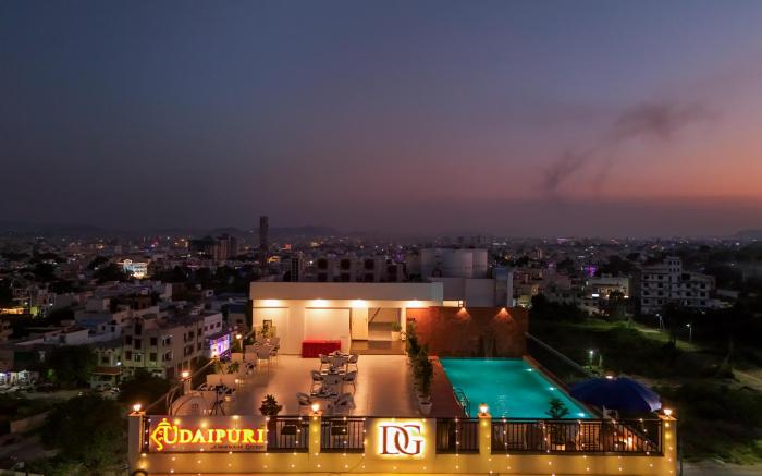 Hotel De Glance - Udaipuri Restaurant I Terrace Swimming pool I Banquet