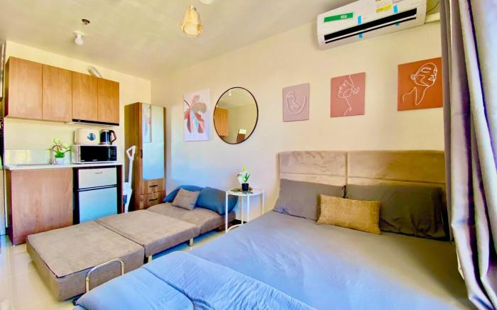 Cozy Condo near Airport, with Pool & Sea View