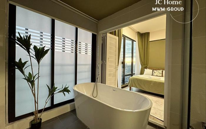 Mosaic Bathtub Tropical Resort Style By JCHome