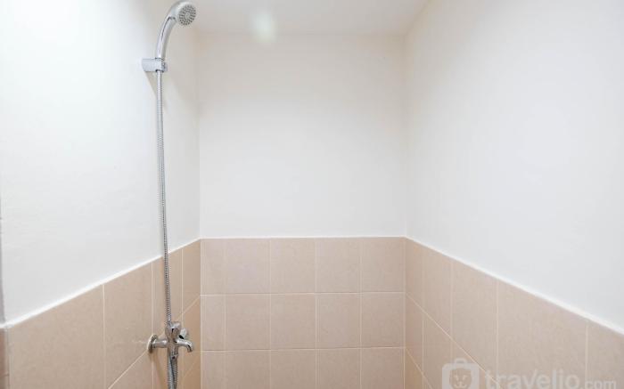 Modern and Cozy 2BR Podomoro Golf View By Travelio