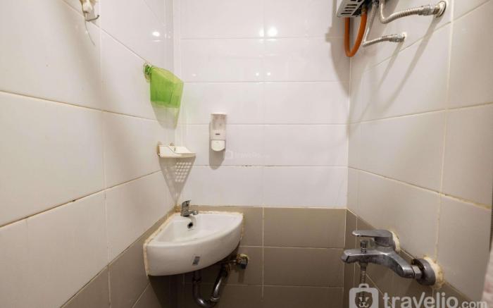 Apt 2BR Pool View Green Pramuka City By Travelio