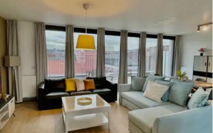 Modern 2BR Penthouse Near Diamond District by OneLuxStay