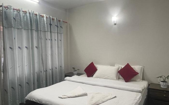 Couple bedroom with attached bathroom & balcony 