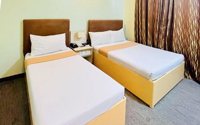 Marianne Suites Hotel by RedDoorz