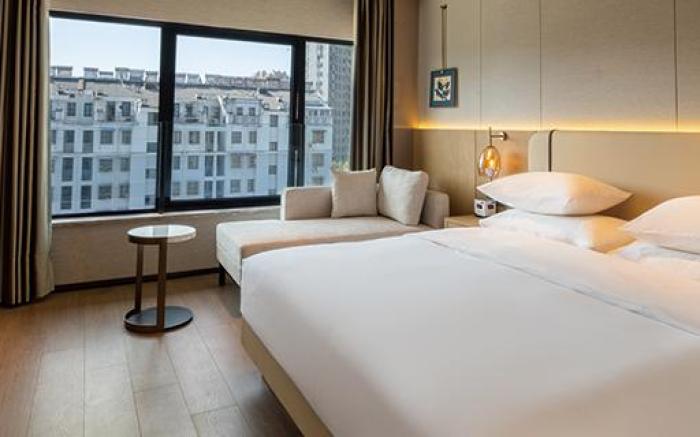 Maison New Century Hotel Lu'an