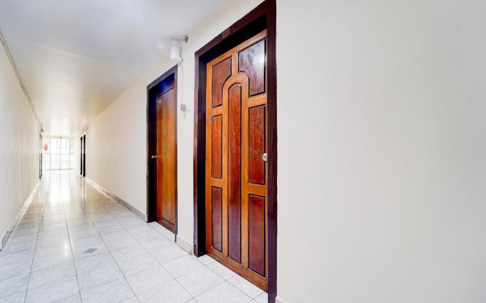 Super Hotel O Pathanamthitta Near Mahatma Gandhi Statue