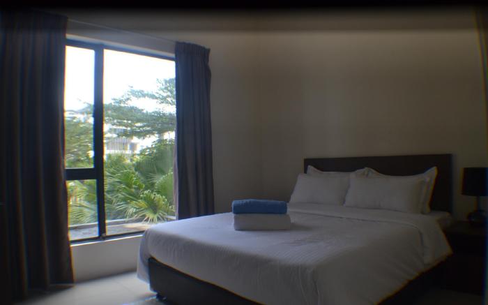 NRASTUDIO POOLVIEW@ SWISS GARDEN RESORT RESIDENCES