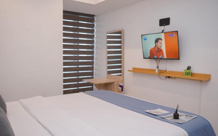 Warm Spacious 1BR Branz BSD City Apt By Travelio