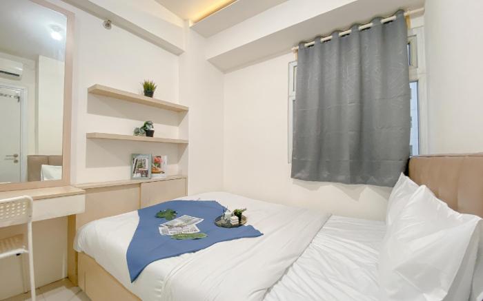 Good Deal Comfy 2BR Green Pramuka City By Travelio