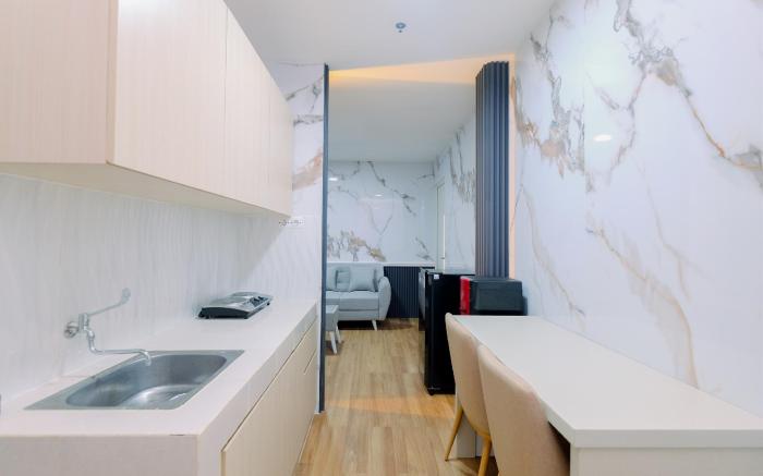 Restful Modern 2BR at Sentul Tower Apt By Travelio