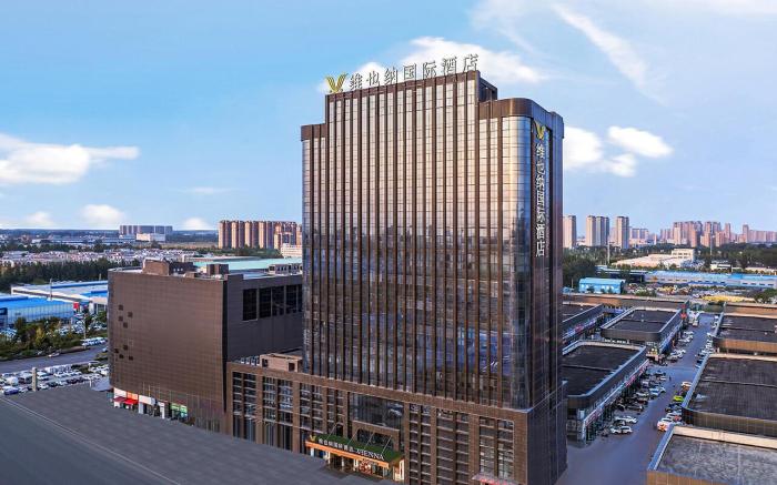 Vienna International Hotel Zhoukou Wanguo Car World Wenchang Wanda