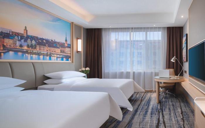 Vienna International Hotel Qingdao Liuting Airport High-speed Railway North Station Xianjiazai Metro