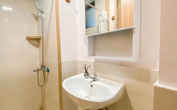 Comfy Stay 2BR at Meikarta Apartment By Travelio
