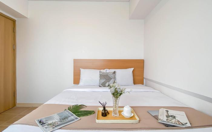 Enjoy Living 2BR at Meikarta Apartment By Travelio
