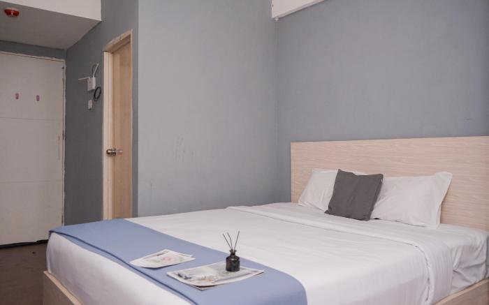 Minimalist Studio Room Urbantown Apt By Travelio