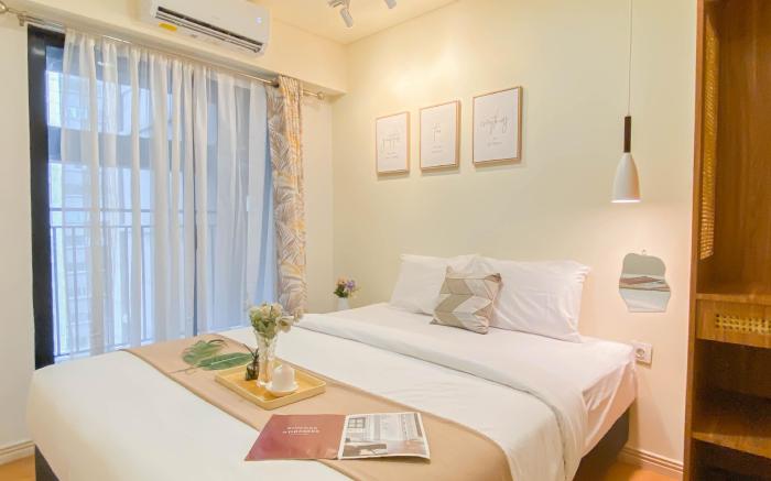 Homey Comfort Living 2BR Meikarta Apt By Travelio
