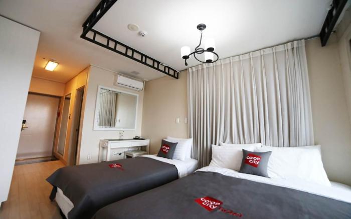 Coop City Hotel Stayco