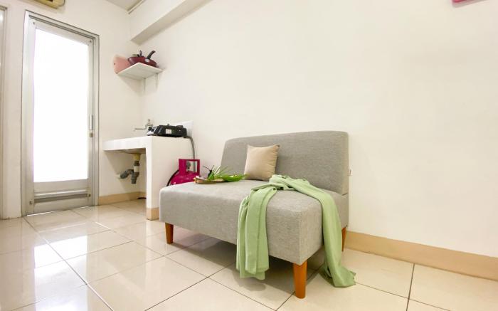 Homey Modern 2BR Green Bay Pluit Apt By Travelio