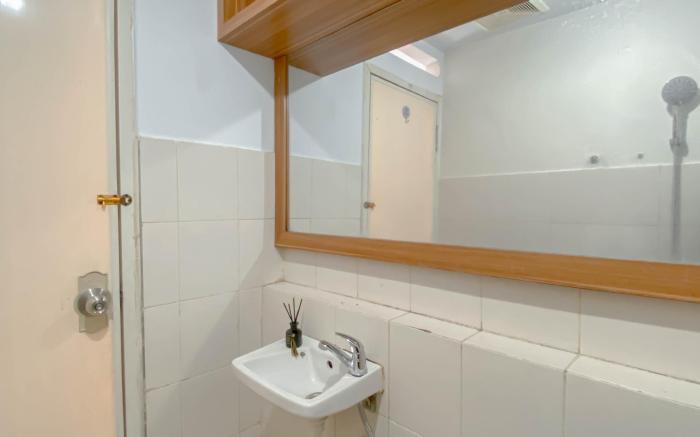 Cozy Studio at Bogor Valley Apartment By Travelio