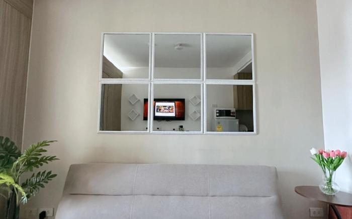 Condo with pool view by Puff Staycation
