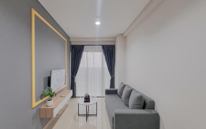 Minimalist 1BR Patraland Amarta Apt By Travelio