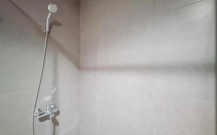 Patraland Amarta 1BR Apartment By Travelio