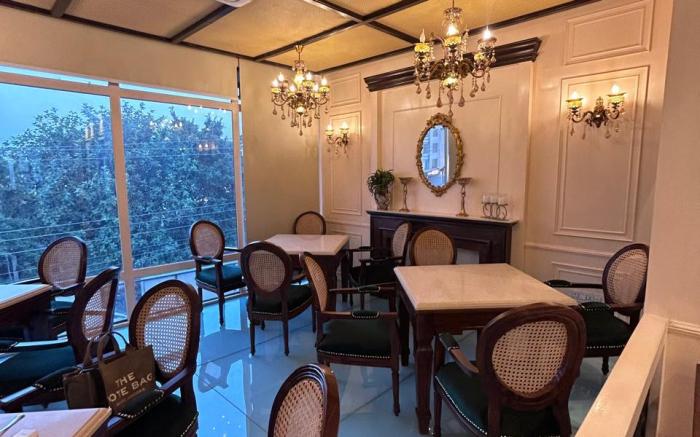 GREEN GARDEN CAFE & HOTEL