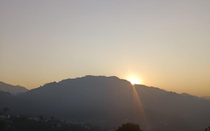 Sun Rise View
Twin Oaks 
kasauli Hills