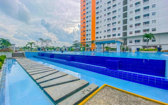 Compact 2BR Apt at Green Pramuka City By Travelio