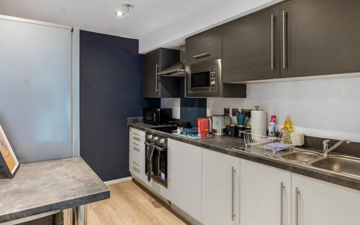 Spacious 4BR Home in Wigan | Garden & Parking