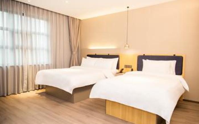 Ease Hotel Yantai Guanhai Road Vientiane City Commercial Center