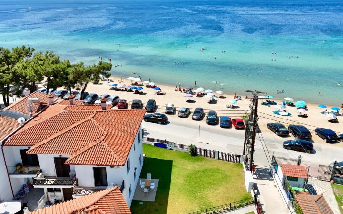 Beachfront Bliss in Nikiti, Spacious 2 Story Villa with Stunning Sea Views