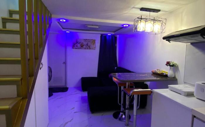 Golden Loft with Mood Lighting,Stylish Staycation Loft  Fast Wi-Fi, Soft Couch