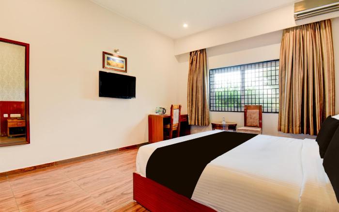 Townhouse Oak Sri Mahadeshwara Convention Centre Formerly Shri Aprameya Resort